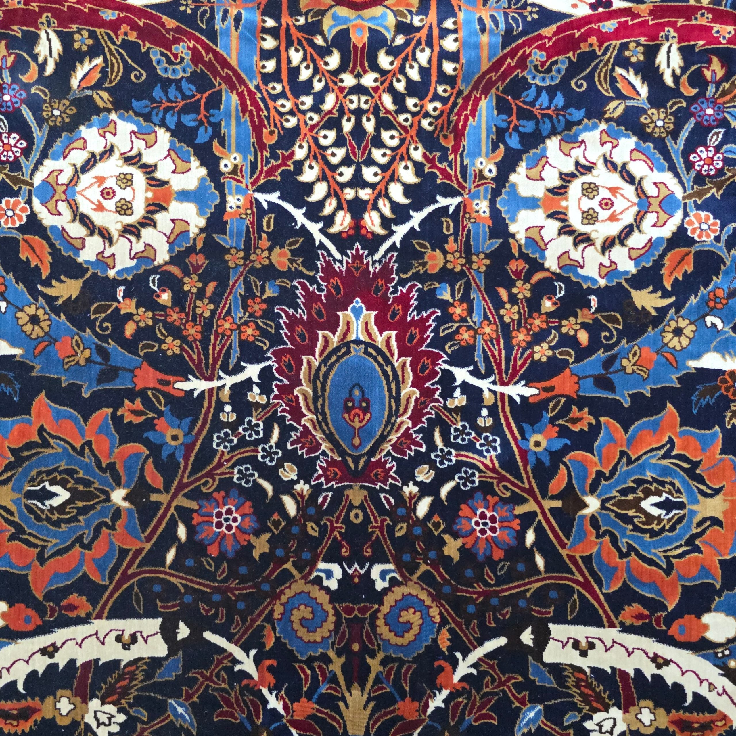 Red and navy sickle leaf rug detail