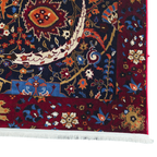Red and navy sickle leaf rug detail