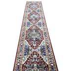 Maroon and green Persian runner rug detail