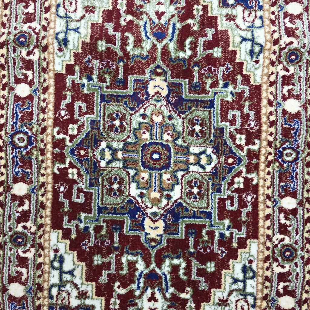 Maroon and green Persian runner rug detail