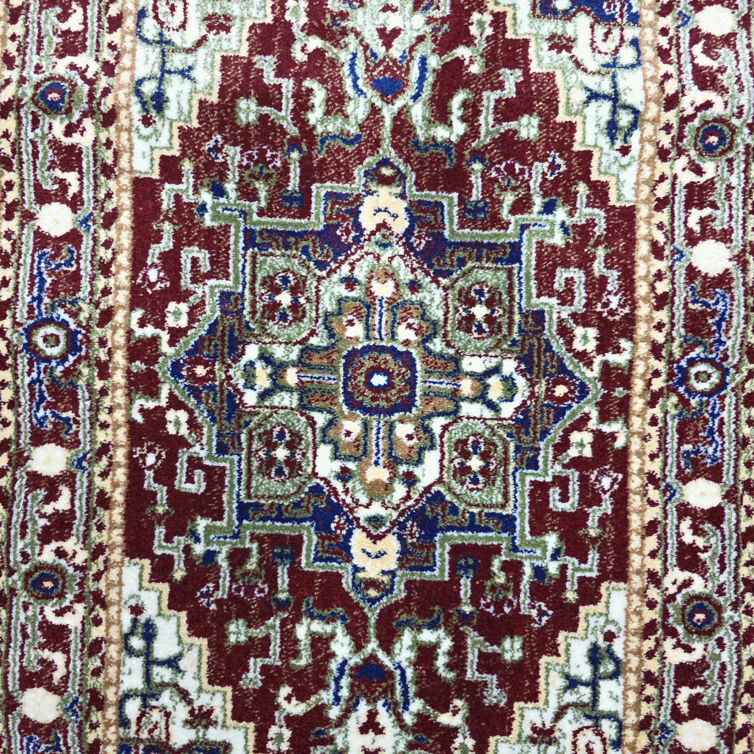 Maroon and green Persian runner rug detail