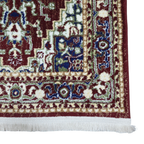 Maroon and green Persian runner rug detail