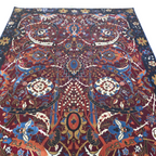 Navy and red sickle leaf rug detail
