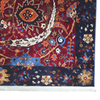 Navy and red sickle leaf rug detail