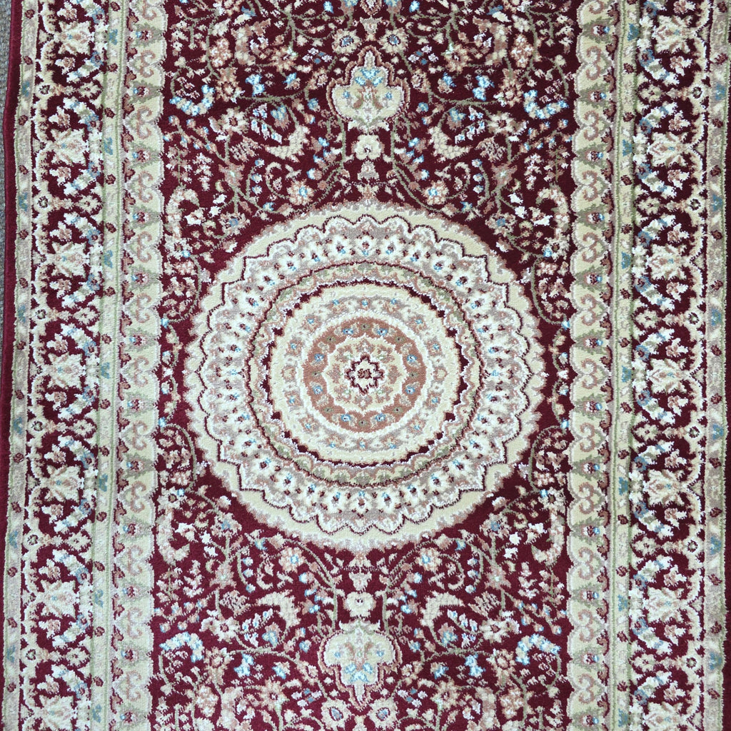 Deep red Persian design runner rug detail