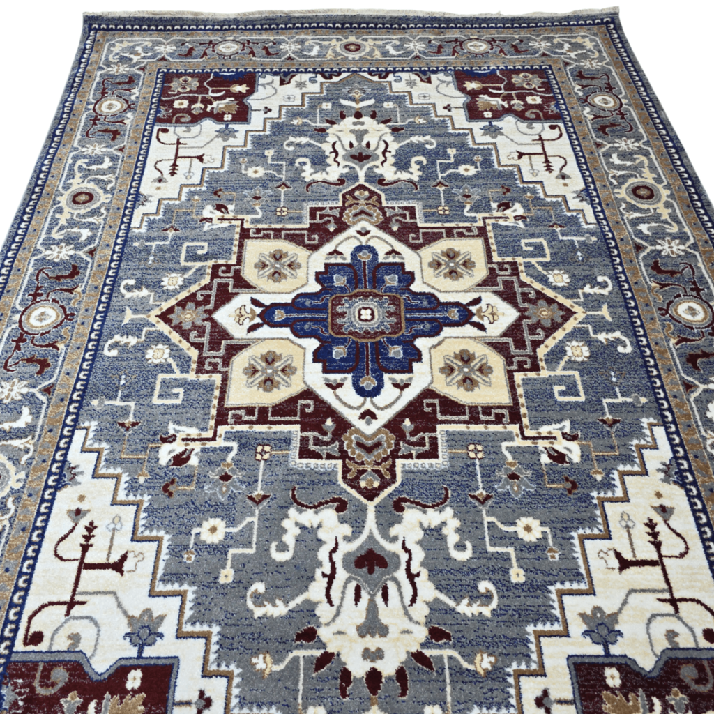 Grey and maroon Heriz design rug detail