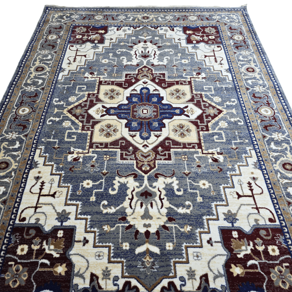 Grey and maroon Heriz design rug detail