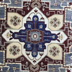 Grey and maroon Heriz design rug detail