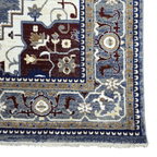 Grey and maroon Heriz design rug detail