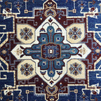 Dark blue and turquoise oriental rug detail