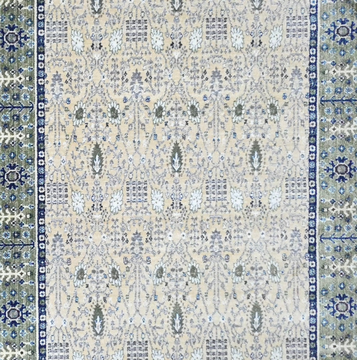 Cream and green traditional oriental rug detail