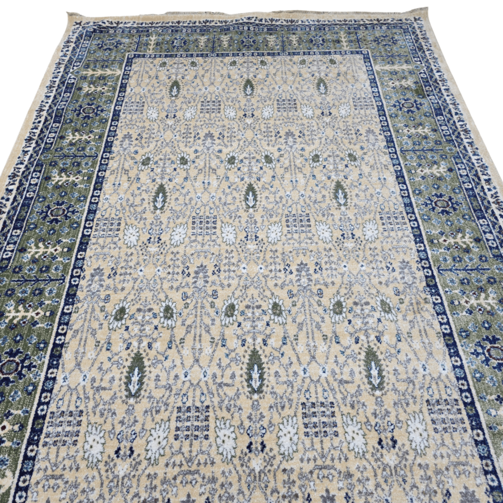 Cream and green traditional oriental rug detail