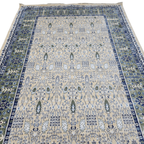 Cream and green traditional oriental rug detail