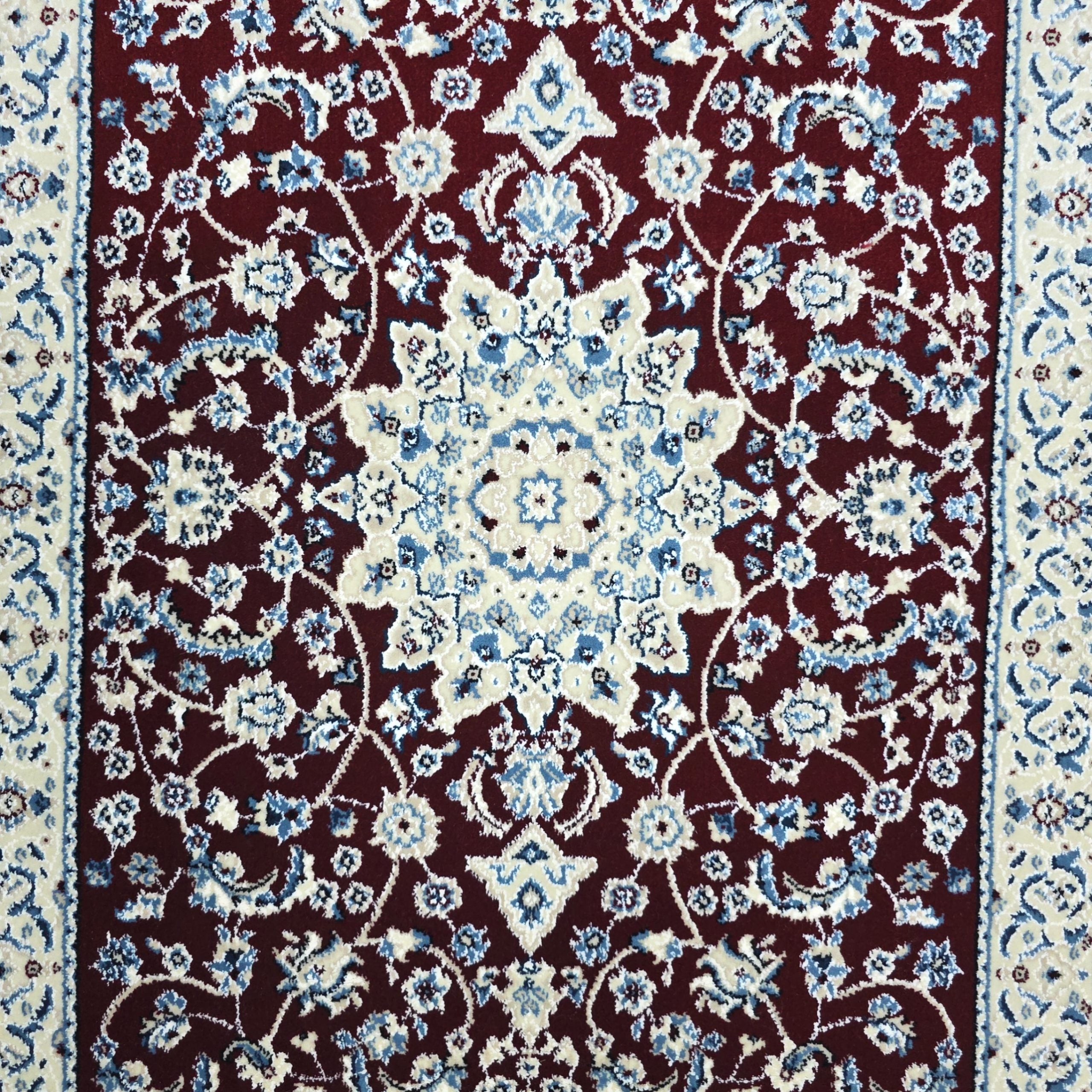 Red Persian design runner rug detail