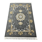 Charcoal and gold Persian rug detail
