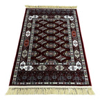 Burgundy Bokhara rug detail