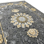 Charcoal and gold Persian rug detail