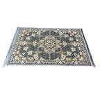 Gold and grey medallion rug detail
