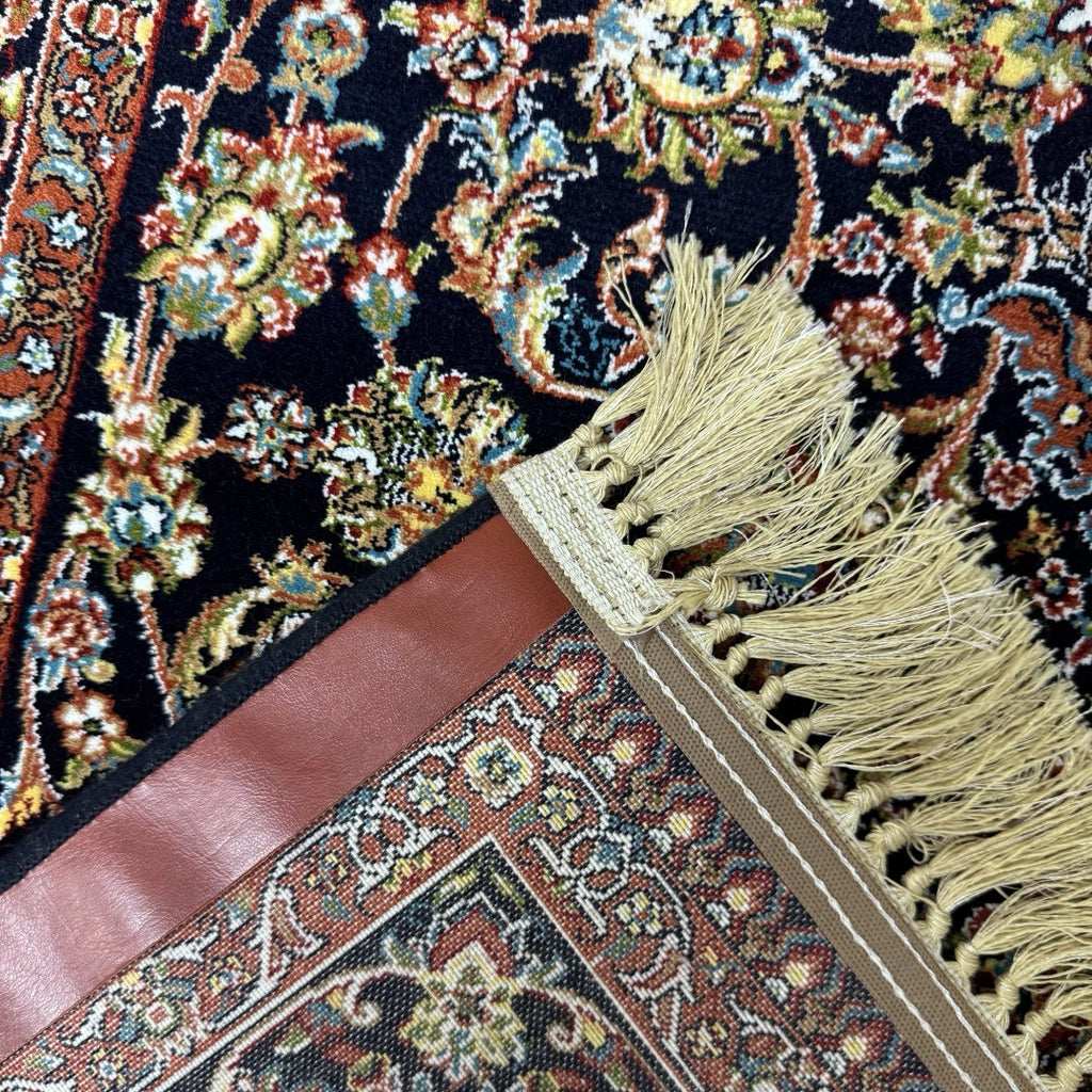 Black and gold Persian rug detail