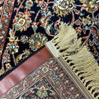 Black and gold Persian rug detail