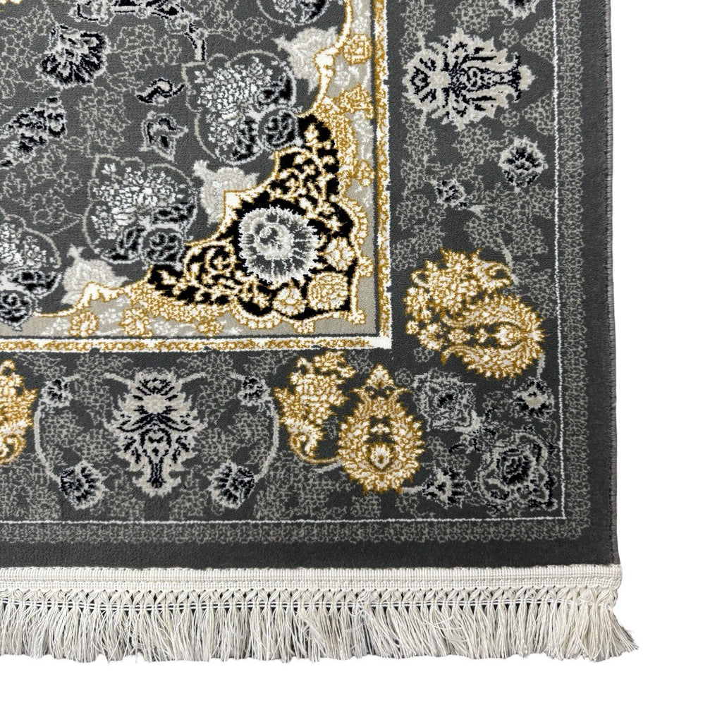 Charcoal and gold Persian rug detail