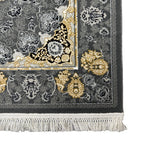 Charcoal and gold Persian rug detail