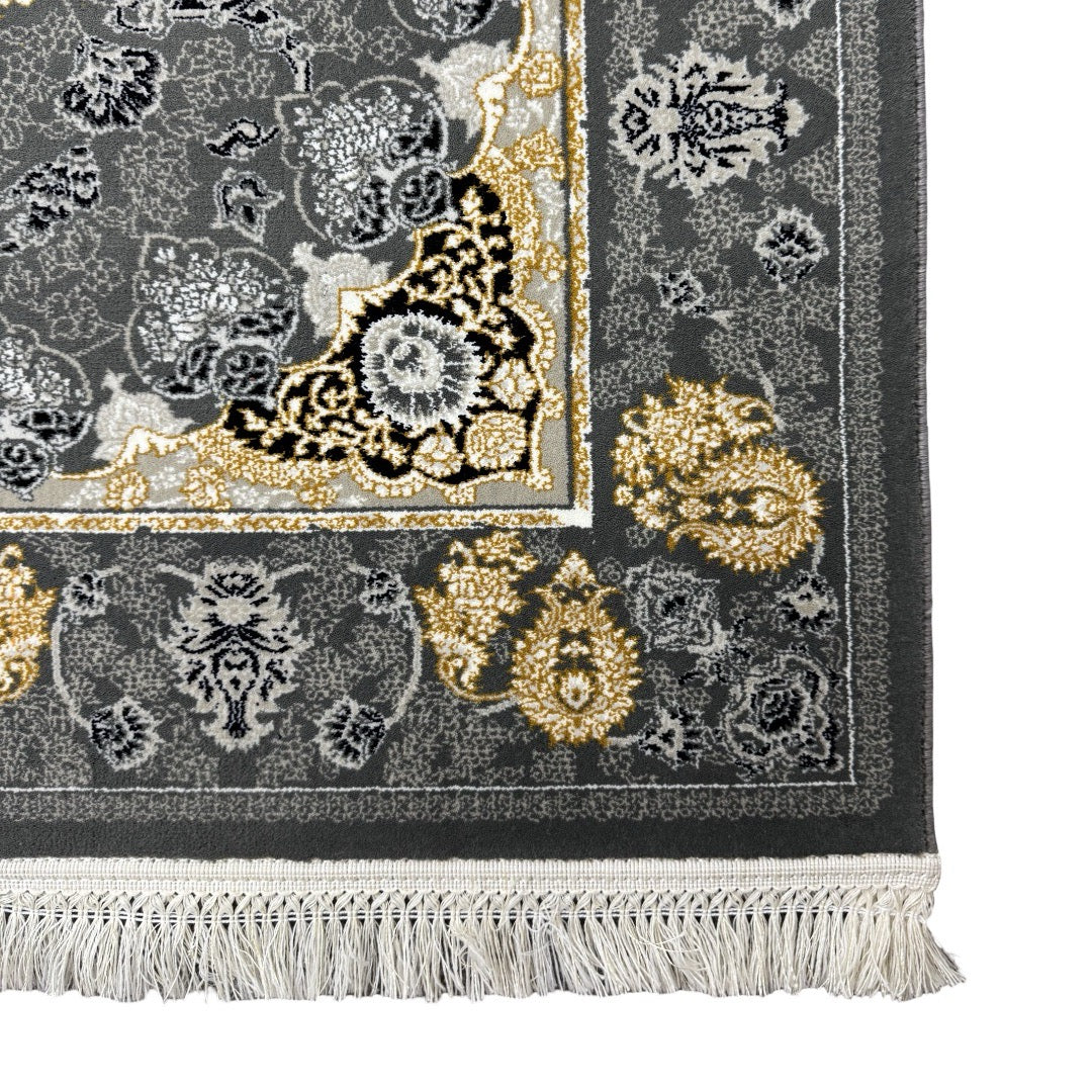 Charcoal and gold Persian rug detail