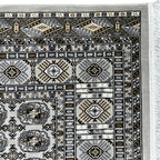 Square cream and grey Bokhara rug detail