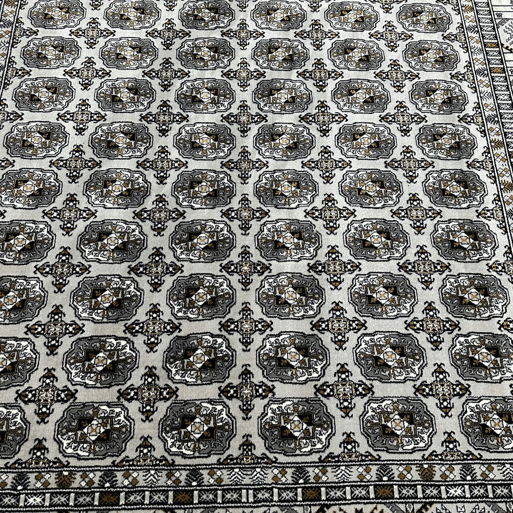 Square cream and grey Bokhara rug detail