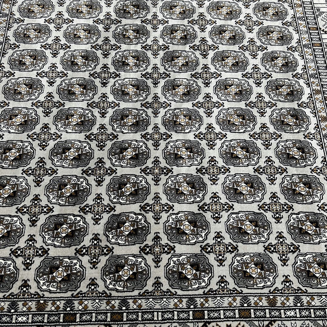 Square cream and grey Bokhara rug detail