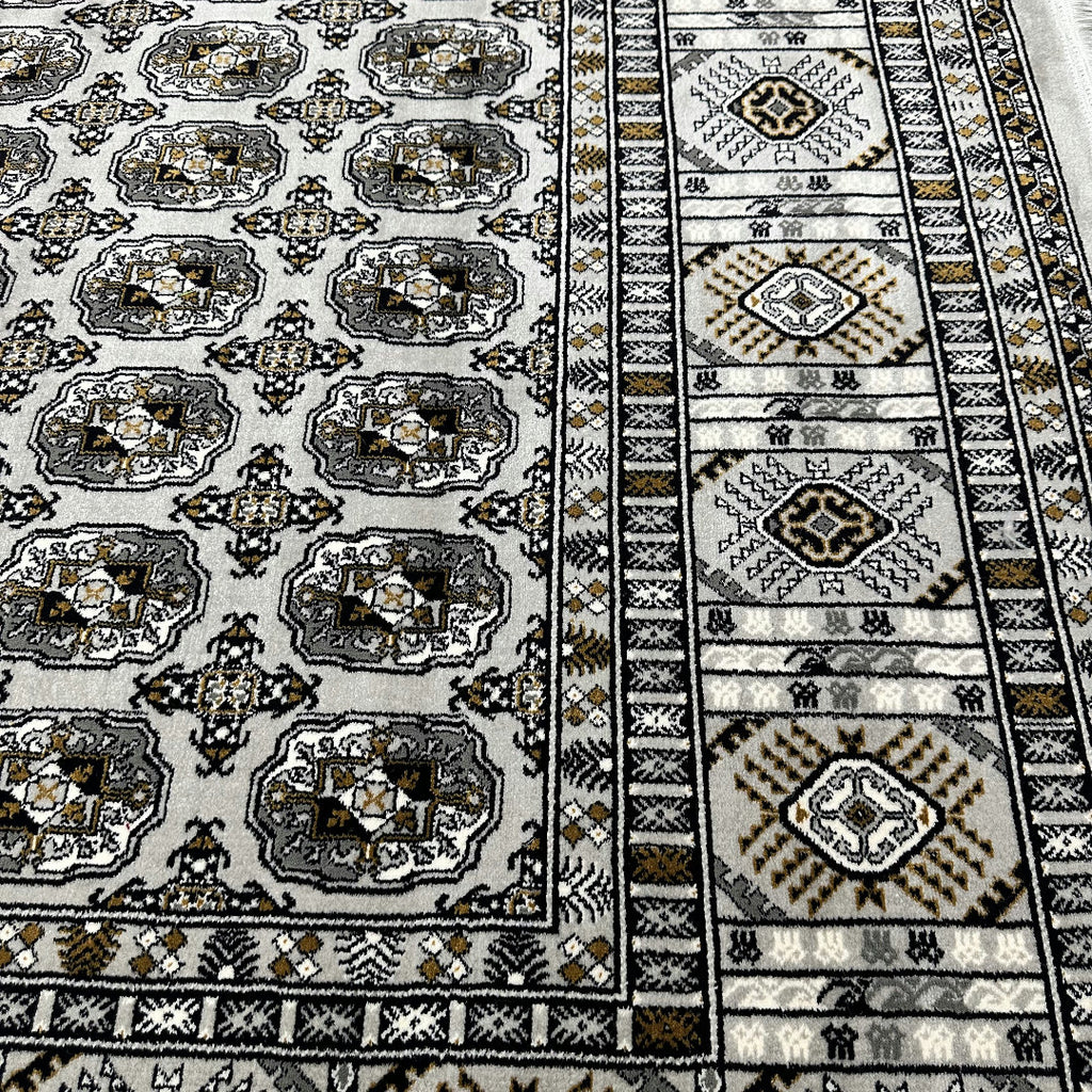 Square cream and grey Bokhara rug detail