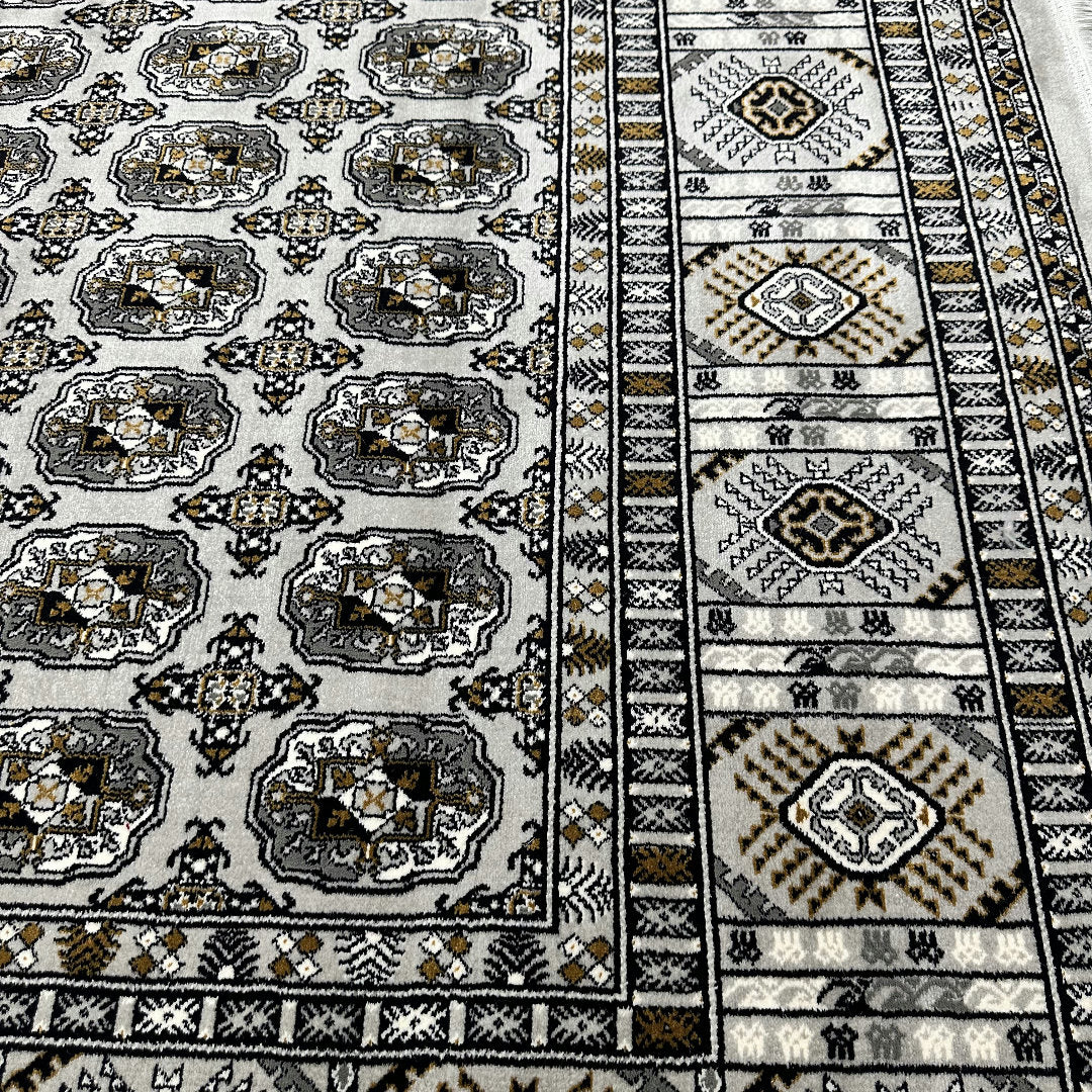 Square cream and grey Bokhara rug detail