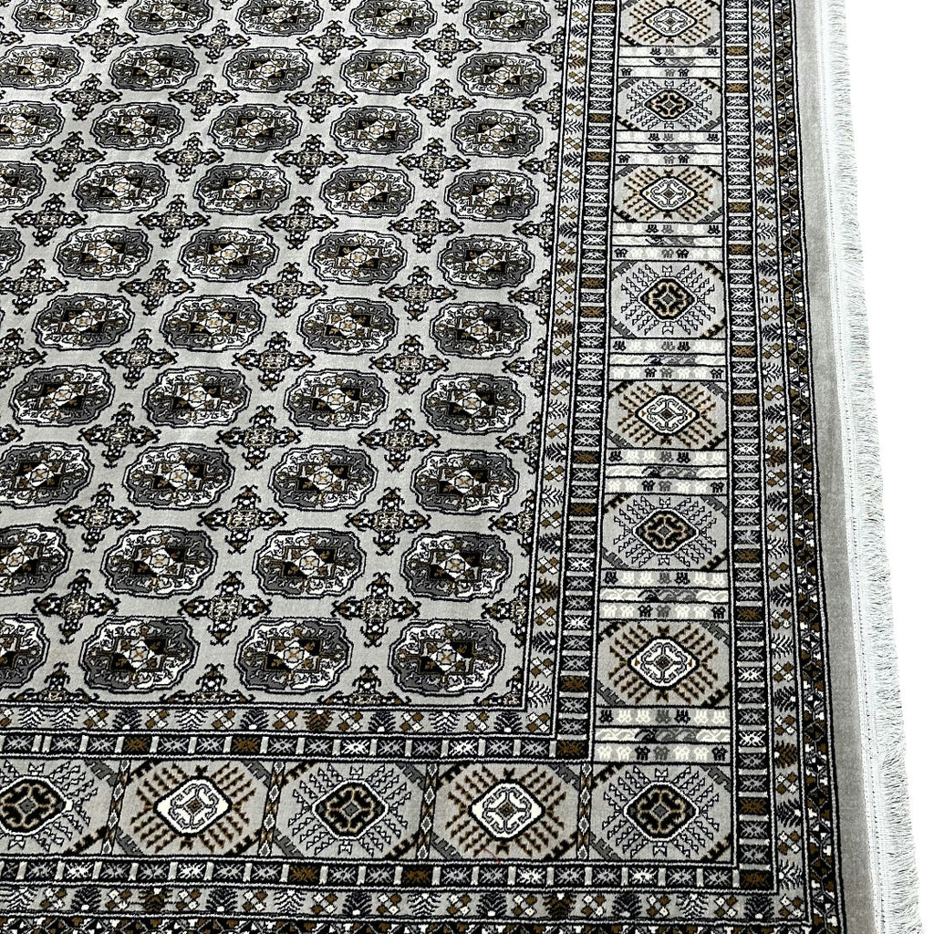 Square cream and grey Bokhara rug detail