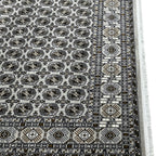 Square cream and grey Bokhara rug detail