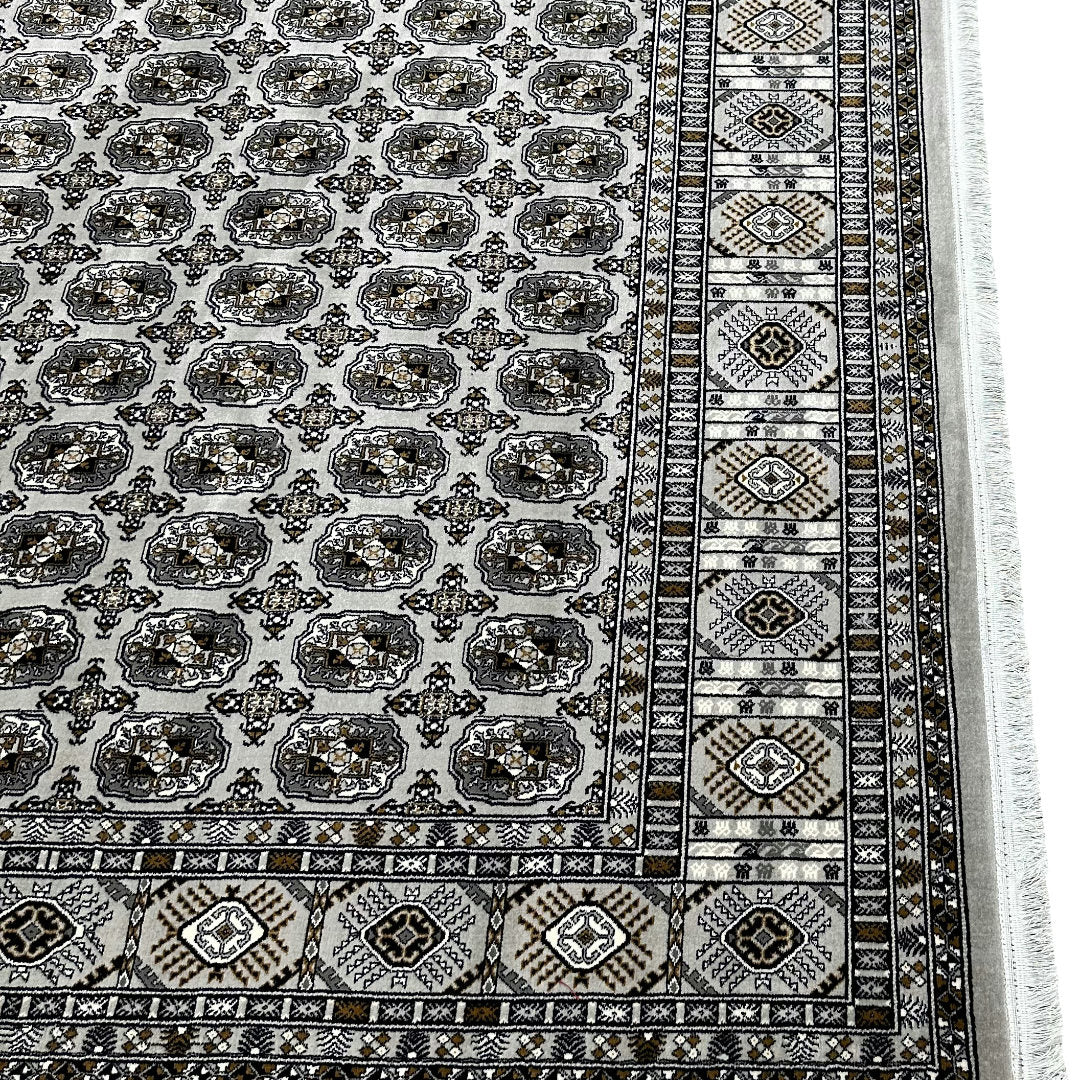 Square cream and grey Bokhara rug detail