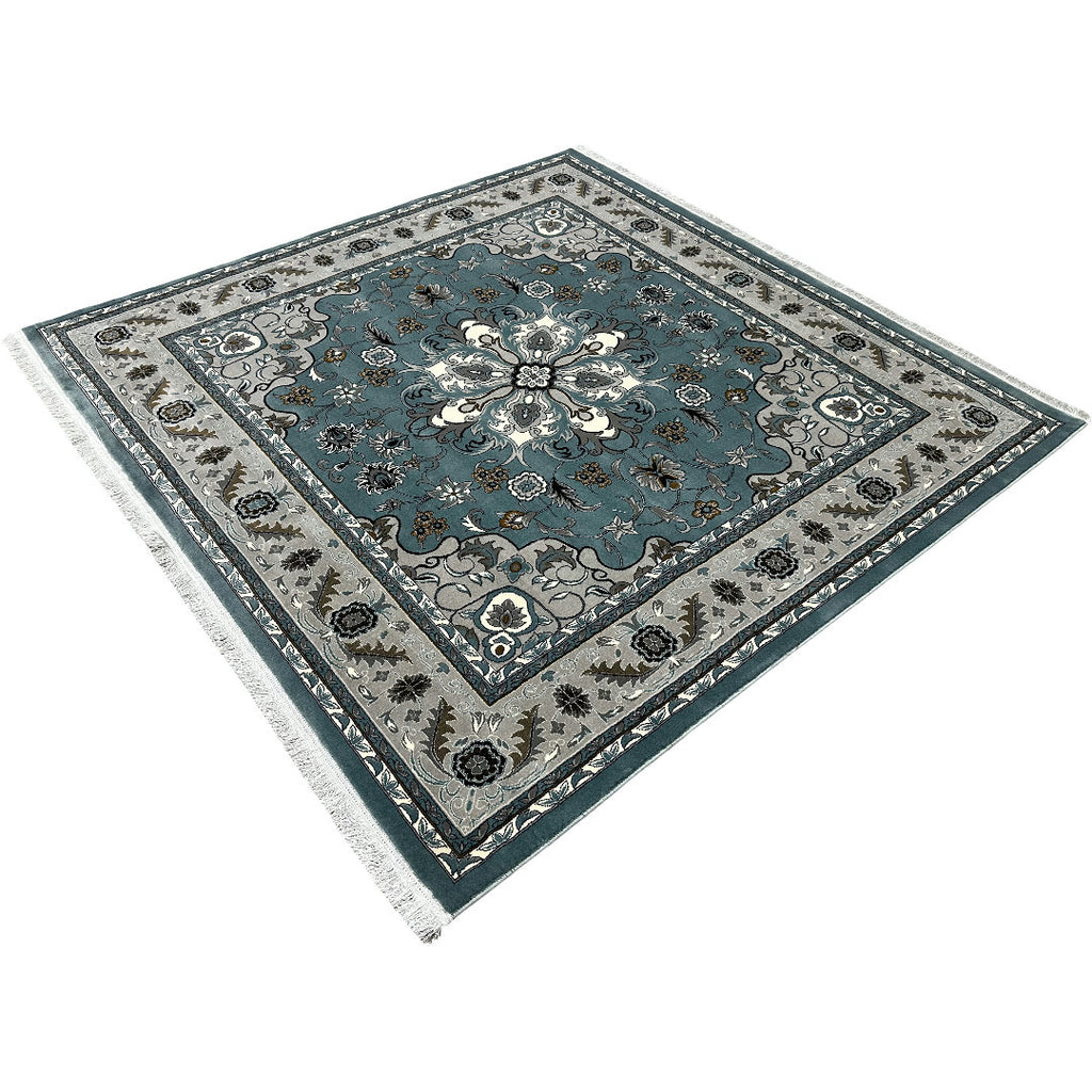 Square blue and cream floral medallion rug detail