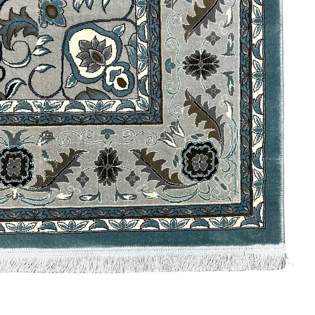 Square blue and cream floral medallion rug detail