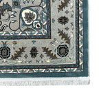 Square blue and cream floral medallion rug detail
