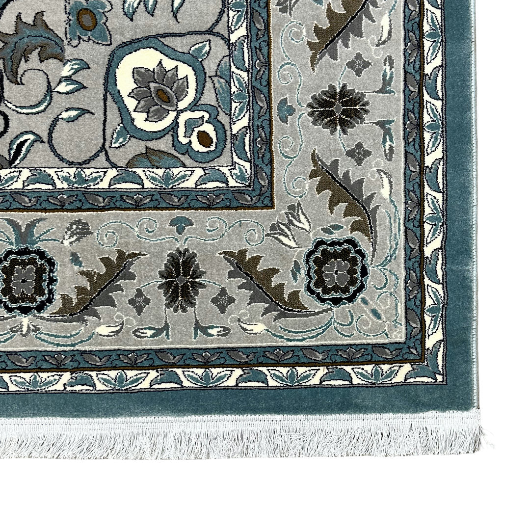 Square blue and cream floral medallion rug detail