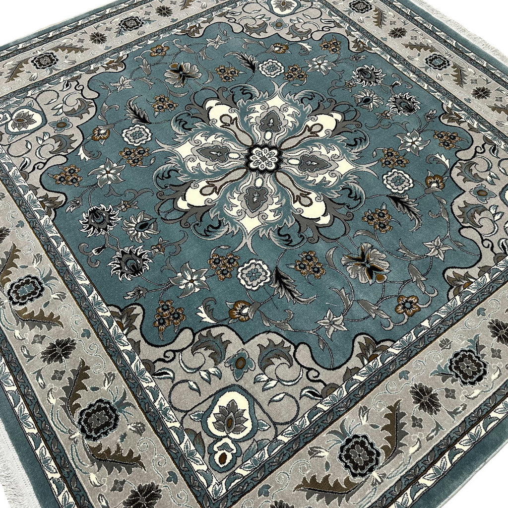 Square blue and cream floral medallion rug detail
