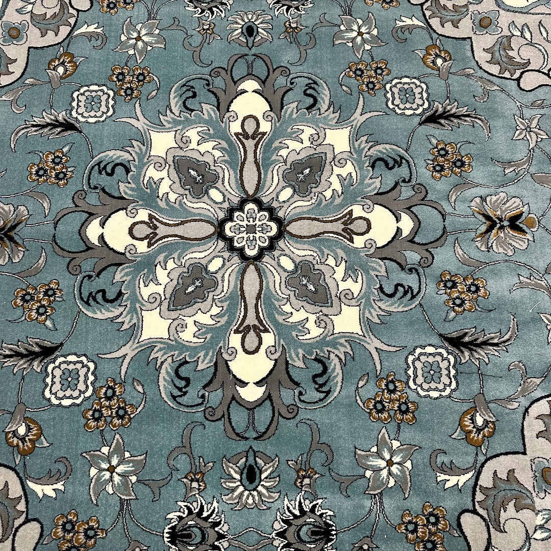 Square blue and cream floral medallion rug detail