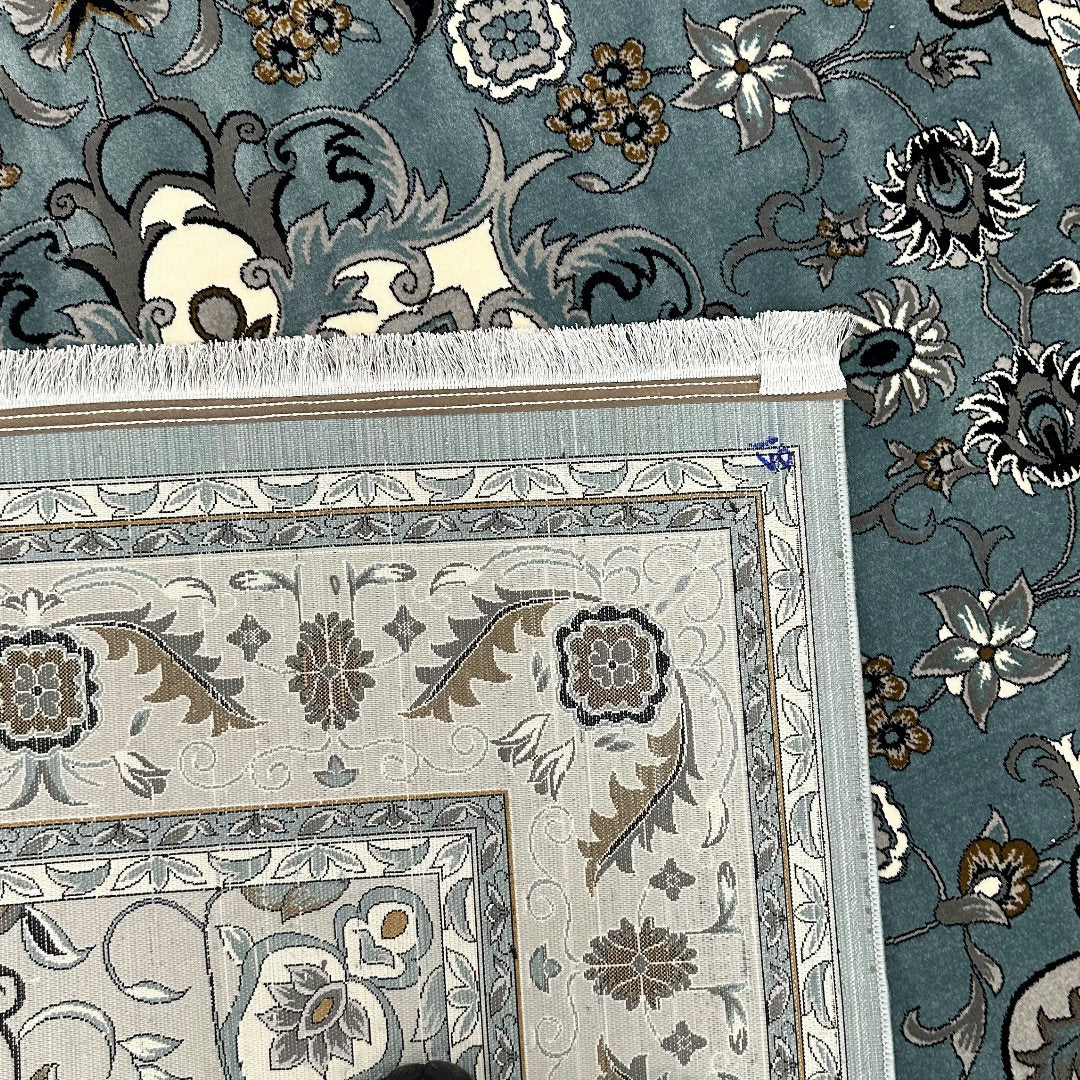 Square blue and cream floral medallion rug detail