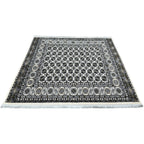 Square cream and grey Bokhara rug detail