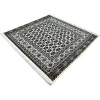 Square cream and grey Bokhara rug detail