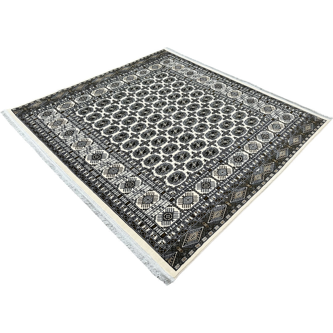 Square cream and grey Bokhara rug detail