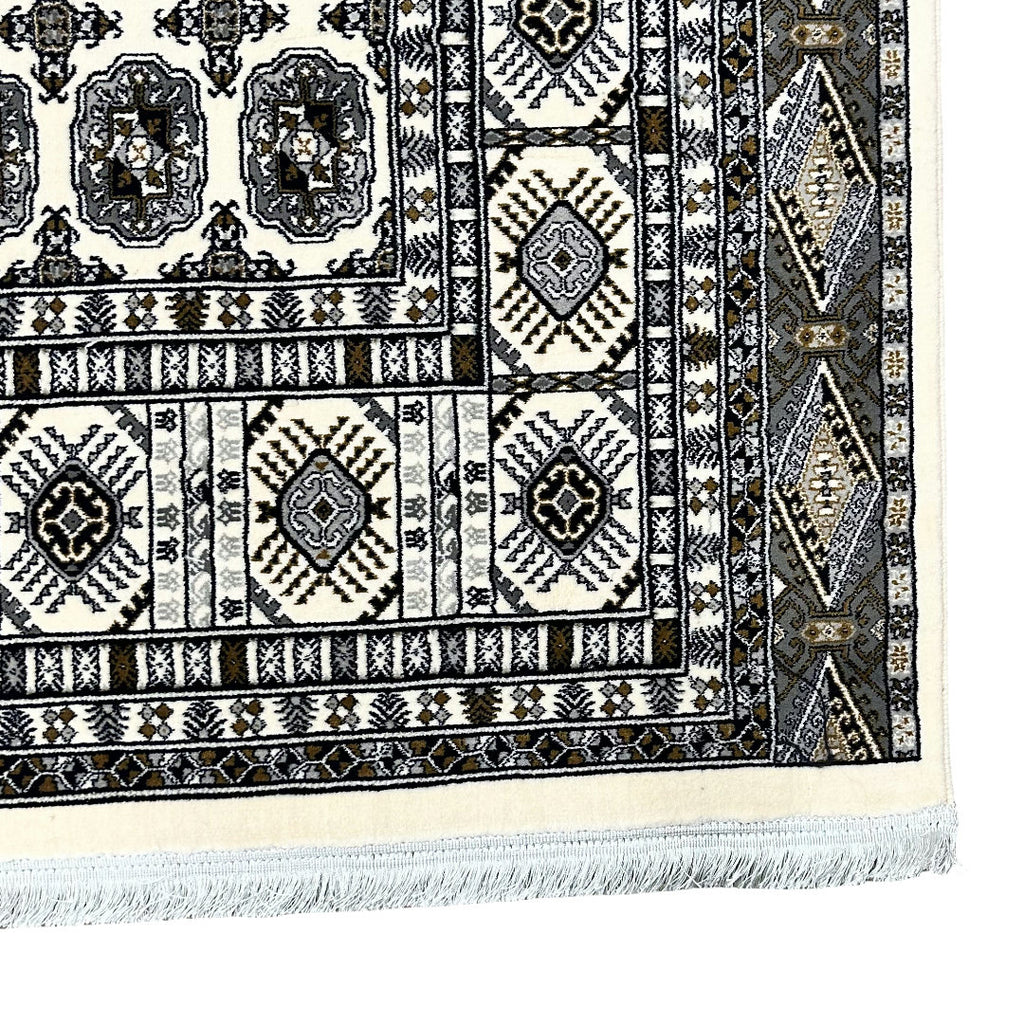 Square cream and grey Bokhara rug detail