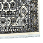 Square cream and grey Bokhara rug detail