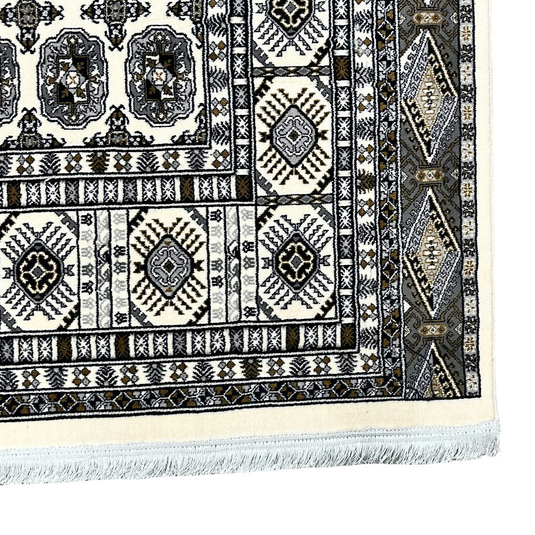 Square cream and grey Bokhara rug detail