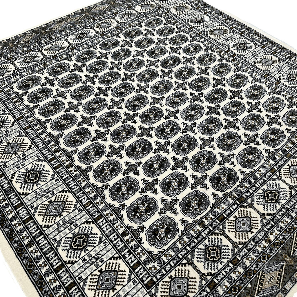 Square cream and grey Bokhara rug detail
