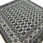 Square cream and grey Bokhara rug detail